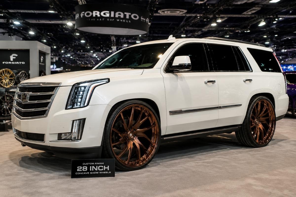 custom bronze 28 inch show wheels Custom finish 28 inch concave show wheels mounted on a display vehicle