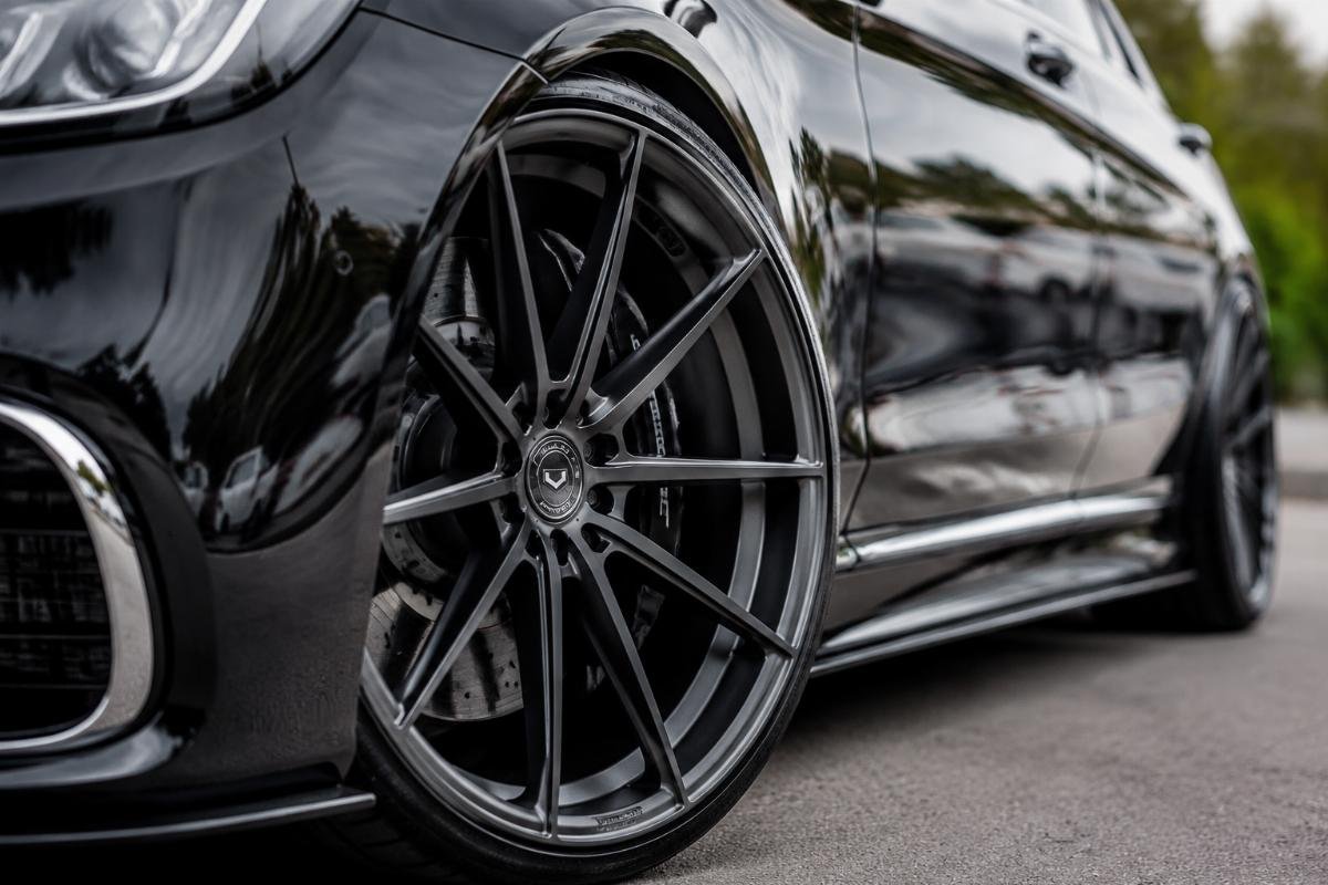 Close-up of 18" to 24" concave modified alloy wheels fitted on luxury passenger vehicles