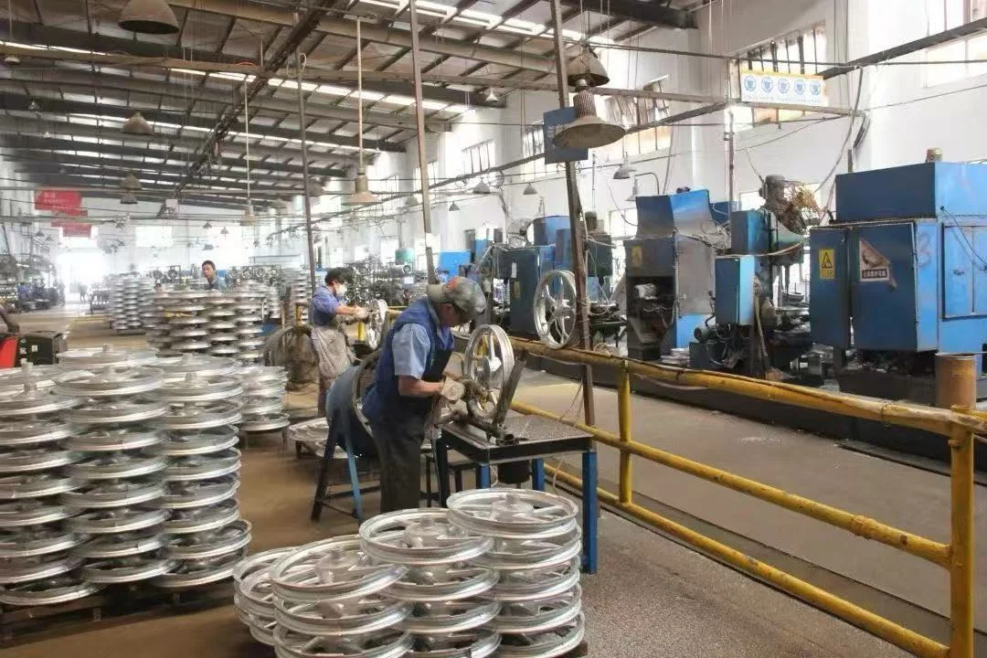 Sourcing team reviewing brake disc samples on a warehouse table